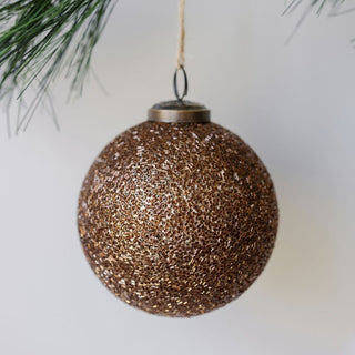 Luxurious 4" Beaded Antique Bronze Glass Ornament by CG Hunter, showcasing an exquisite antique gold beaded mercury finish, elegantly hanging from a natural jute hanger.
