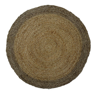 Top view of the CG Hunter Natural and Brown Round Braided Jute Rug displaying its intricate braided design. Ideal for sophisticated decor, this sustainable jute rug brings warmth and style to various interiors.