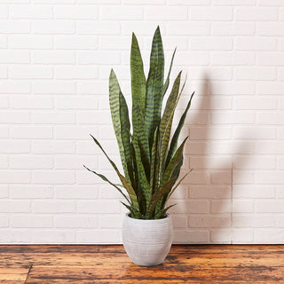 Impressive faux snake plant featuring tall, elegant leaves in a contemporary grey planter by CG Hunter, ideal for any decor setting.