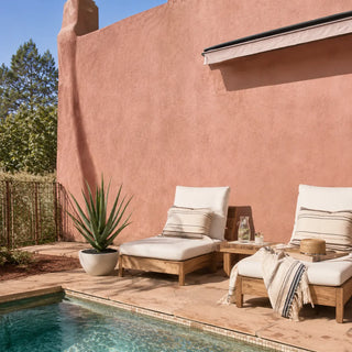 31.5-inch artificial agave plant in a stone-finish pot beside pool lounge chairs for summer pool decor
