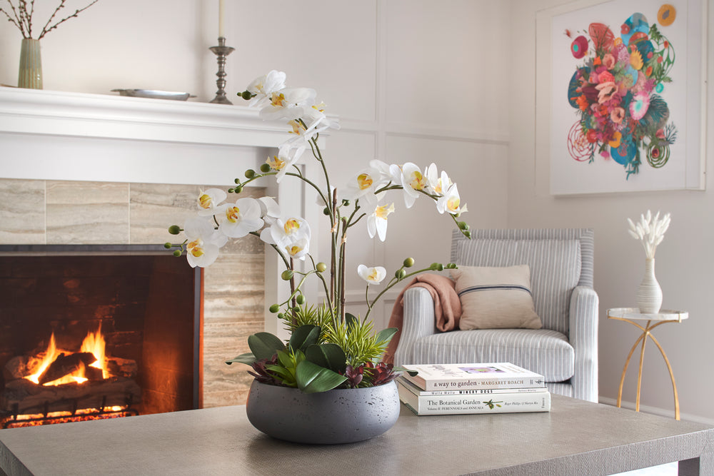 Faux orchid for interior designers, hospitality, offices, and homeowners - looks just like the real orchid - beautiful blooms in a round modern pot