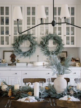 Elegant display of handmade terracotta vases and stylish candle holders. Perfect for gifting, these unique pieces represent luxury in seasonal home decor gifts from CG Hunter, ideal for enhancing festive celebrations.