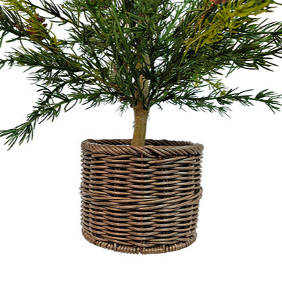 Close-up view of a CG Hunter 2-Foot Pine Tree's luxurious brown woven basket, showcasing its sturdy design and rustic charm.
