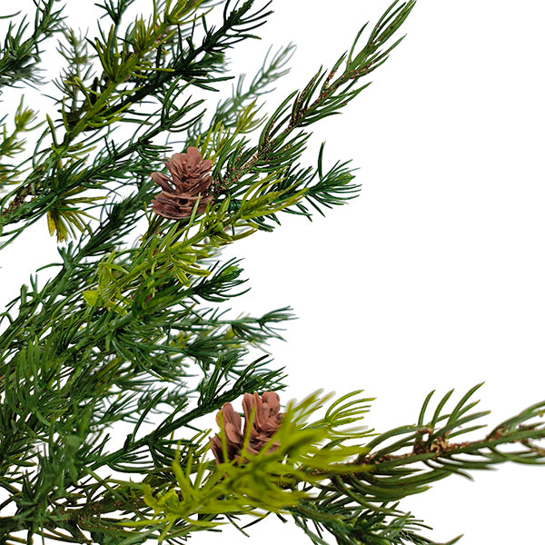 Detailed image of the CG Hunter 2' Pine Tree featuring a branch adorned with rustic mini pinecones, enhancing its authentic woodland appeal.