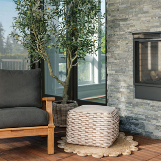 Elegant Square Handwoven Loop Ottoman Pouf by CG Hunter, beautifully styled in a cozy living space with natural elements and sophisticated decor.
