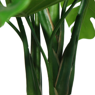 Close-up view of the realistic hand-painted trunks of the 4' Monstera plant by CG Hunter, showcasing its exquisite craftsmanship and attention to detail.