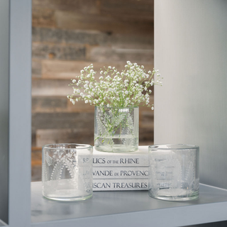 Shorter Etched Vases on Shelving in House with Flowers