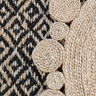 Detailed view of the CG Hunter Natural and Black Diamonds Jute Rug alongside woven elements, emphasizing craftsmanship and luxury.
