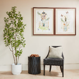 Elegant decor featuring CG Hunter's 7' Artificial Heart Ficus Tree in a sleek white pot, harmonizing beautifully with a stylish chair and framed art.