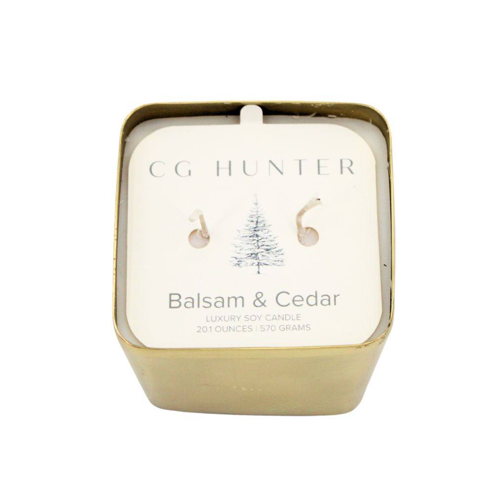 Luxury CG Hunter Balsam and Fir Candle in a sleek gold container, showcasing smooth ivory wax and elegant design, perfect for holiday decor.