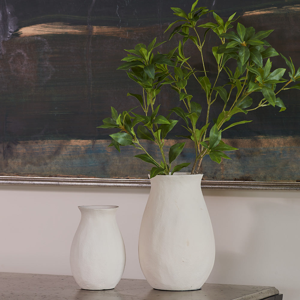 Creme vase with green branch