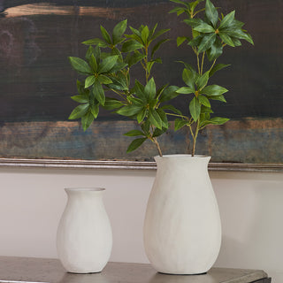Stylish Charlotte Aluminum Vases by CG Hunter, highlighting a large white vase filled with foliage, designed to elevate your entertaining experience.