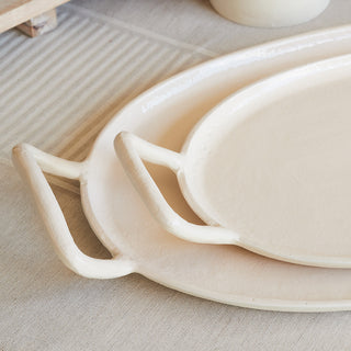 Stylish Charlotte Serving Trays by CG Hunter, featuring unique handles and an elegant design to enhance your entertaining experience.