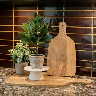 Charming 16" citrus topiary with a realistic appearance, displayed on a wooden cutting board, nestled among modern decor, by CG Hunter.