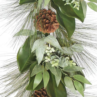 Close-up detail of the 6' Magnolia, Eucalyptus, Pinecone, & Needle Pine Garland by CG Hunter, highlighting the lush foliage, textured eucalyptus leaves, and pinecones, perfect for exquisite seasonal decor.