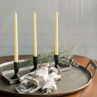 Stylish tabletop arrangement with CG Hunter Handcrafted Linen Eggplant and Grey Roses Napkins alongside tapered candles, creating a refined ambiance for dinner gatherings.
