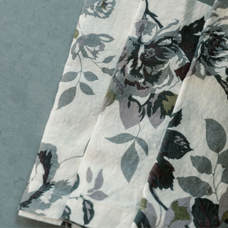 Elegant CG Hunter Eggplant and Grey Roses Tablecloth and Napkins designed with sophisticated floral patterns on a refined backdrop, perfect for upscale dining occasions.