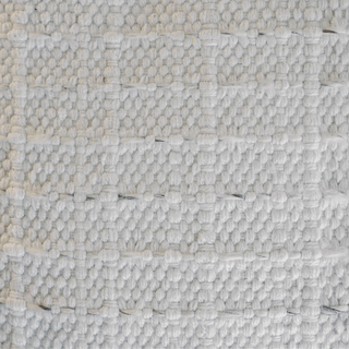 Detailed view of the soft, neutral fabric on the CG Hunter Square Striped Woven Ottoman Pouf, showcasing premium craftsmanship.