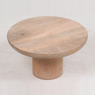 Charlotte Wood Serving Pedestal by CG Hunter, showcasing a beautifully crafted round wooden pedestal with a natural finish, perfect for elegant table settings.