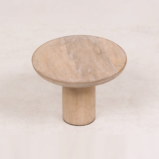 Sleek and minimalistic design of the Charlotte Wood Serving Pedestal by CG Hunter, showcasing eco-friendly materials in a sophisticated home setting.