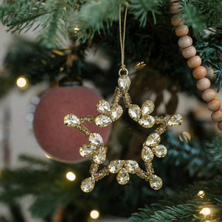 Beautiful gold star ornament from CG Hunter, adorned with sparkling jewels, perfect for upscale Christmas decorations and festive gifting.