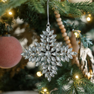 Elegant silver beaded snowflake ornament by CG Hunter, showcasing intricate craftsmanship, adding a touch of luxury to holiday celebrations.