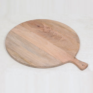 Artisan-crafted round wooden serving board from CG Hunter's Charlotte Collection, highlighting elegant wood tones and a handle, perfect for enhancing any gourmet dining setting.