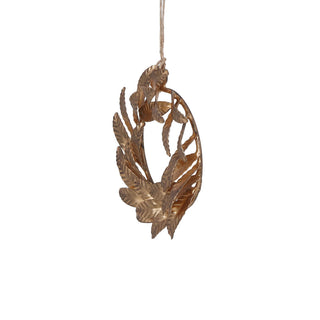 Detailed image of a 5-inch brass iron wreath ornament, showcasing intricate craftsmanship, suspended elegantly. A stunning artisan creation from CG Hunter for upscale holiday decor.