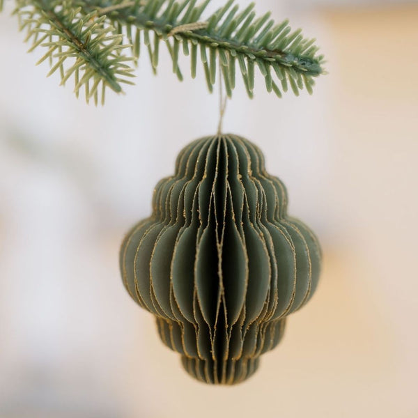 Stylish CG Hunter 3" Paper Honeycomb Assorted Ornament in rich forest green, beautifully suspended from a tree branch, highlighting its elegant texture and festive charm.