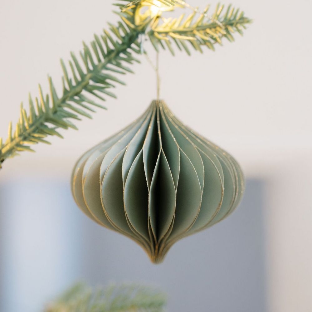 Elegant Mini Paper Honeycomb Assorted Ornament by CG Hunter, showcasing a sophisticated green design, delicately hanging on a tree branch.