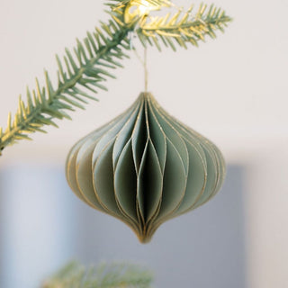 Elegant Mini Paper Honeycomb Assorted Ornament by CG Hunter, showcasing a sophisticated green design, delicately hanging on a tree branch.