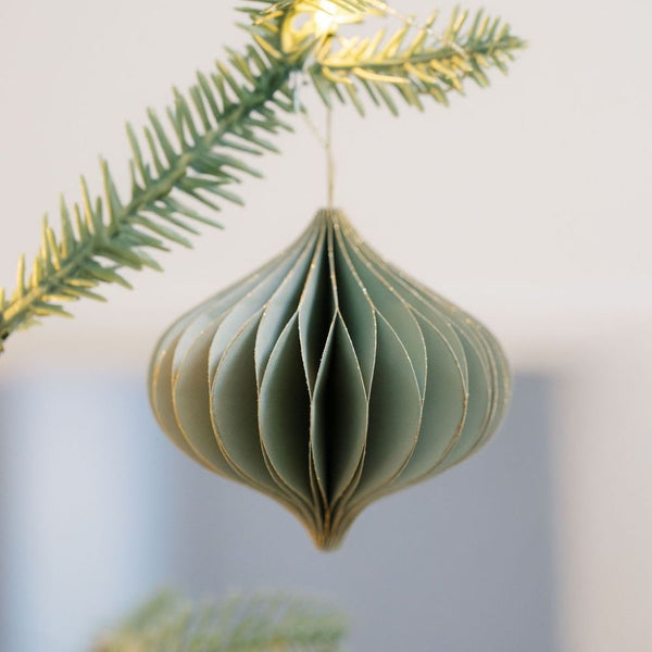 Elegant Mini Paper Honeycomb Assorted Ornament by CG Hunter, showcasing a sophisticated green design, delicately hanging on a tree branch.