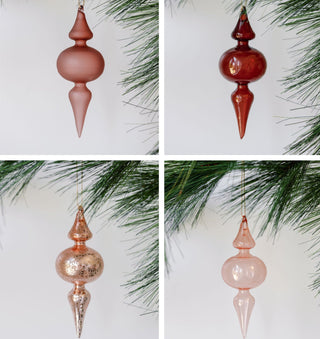Elegant assortment of vintage rose and Bordeaux glass finial ornaments by CG Hunter, showcasing a variety of textures and finishes, ideal for sophisticated holiday decor.