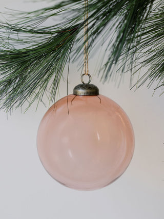 Elegant 4-inch assorted vintage rose glass ornament by CG Hunter, featuring a glossy finish, suspended gracefully from a pine branch, perfect for enhancing holiday decor.
