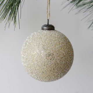 Elegant 4" Beaded Cream Glass Ornament by CG Hunter, featuring a sparkling creamy finish, perfect for enhancing your holiday decor.
