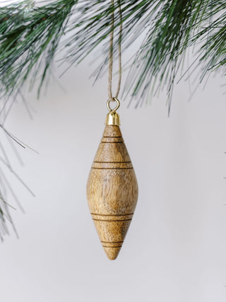 Exquisite natural mango wood ornament by CG Hunter, featuring elegant stripes, delicately displayed against a minimalist background.