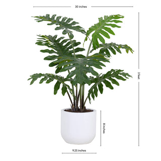 Full view of the 3' Faux Potted Philodendron by CG Hunter, featuring vibrant green leaves and dimensions, ideal for transformative interior design.