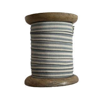 CG Hunter Grosgrain Ribbon in White and Grey, 10 Yards per Spool, showcasing a luxurious striped design on a wooden bobbin.