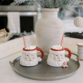 Charming Decorative Aluminum Serving Tray by CG Hunter, displaying whimsical Santa mugs filled with marshmallows, creating a festive holiday ambiance.