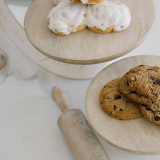 Close-up of delectable cookies displayed on the Charlotte Wood Serving Pedestal by CG Hunter, emphasizing artisanal craftsmanship and a stylish approach to entertaining.