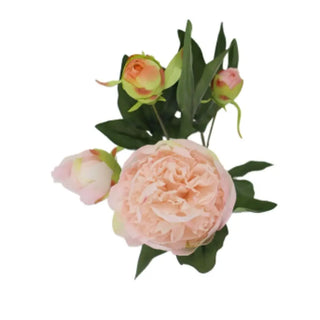 Artificial flower arrangement with pink peony and green leaves on a white background