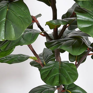 Detailed view of the foliage on the Artificial Fiddle Leaf Fig Tree by CG Hunter, showcasing a lifelike appearance that brings a touch of luxury to your home.