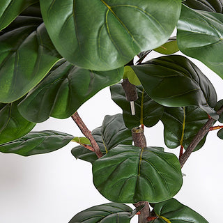 Close-up view of the lifelike leaves of the artificial Fiddle Leaf Fig Tree with Artisan Planter by CG Hunter, highlighting the detailed craftsmanship.
