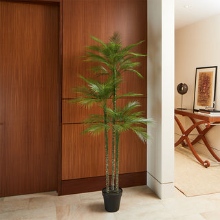 7' Artificial Palm Tree by CG Hunter elegantly placed in a stylish interior setting, emphasizing its lush fronds and contemporary black pot, enhancing the modern decor.