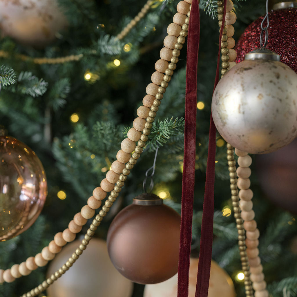 5" Frosted Glass Ornament Espresso on timeless collection tree with ribbon and wood garland