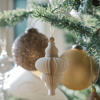 Exquisite 4" Beaded Antique Bronze Glass Ornament by CG Hunter displayed among various luxurious ornaments on a holiday tree, capturing an elegant ambiance for the festive season.