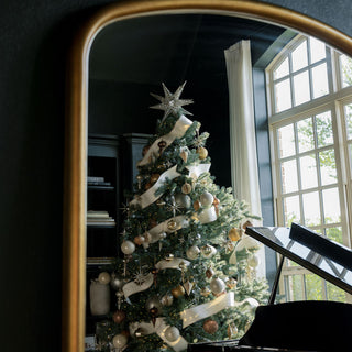 Elegant Christmas tree adorned with luxurious ornaments, reflecting the artistry of CG Hunter's 3" Artisan Glass Gold Etched Leaf Ornament.