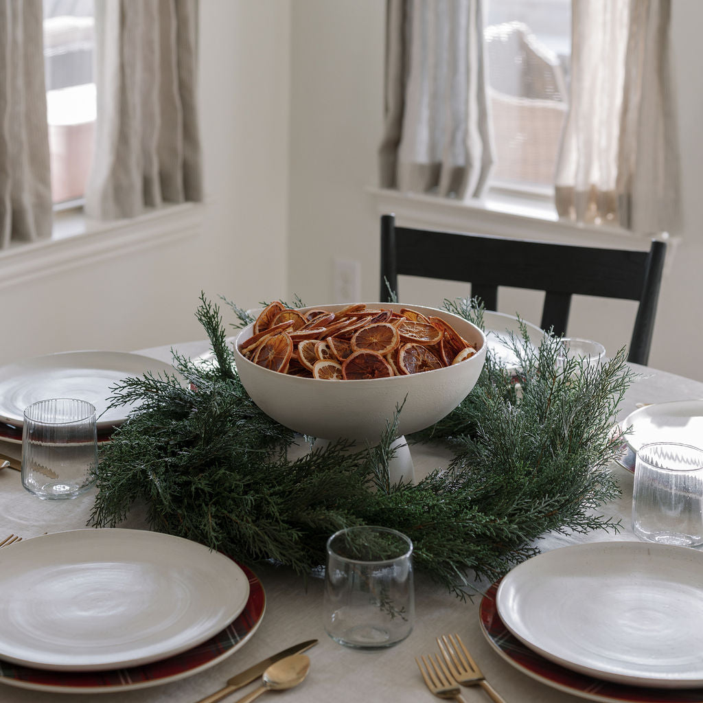 30" Lifelike Cedar Wreath as centerpiece on table