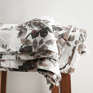 Luxury CG Hunter Eggplant and Grey Roses Tablecloth showcasing delicate rose patterns draped elegantly.