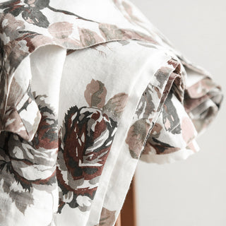 Close-up view of CG Hunter Eggplant and Grey Roses Tablecloth featuring intricate floral designs in luxury fabric.